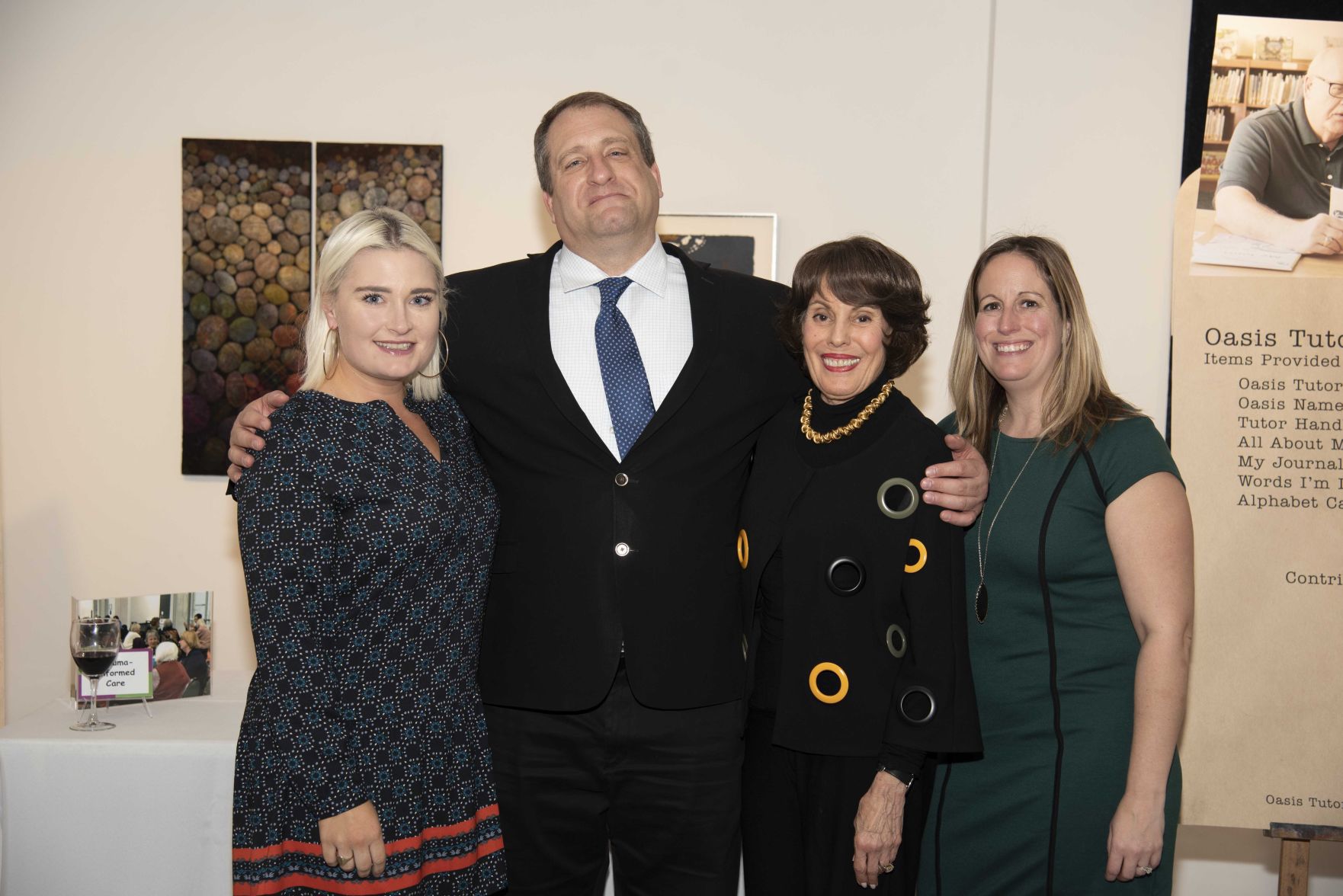 ItÕs all smiles for members of the Oasis Resource Development team, President Paul Weiss and Founder Marylen Mann